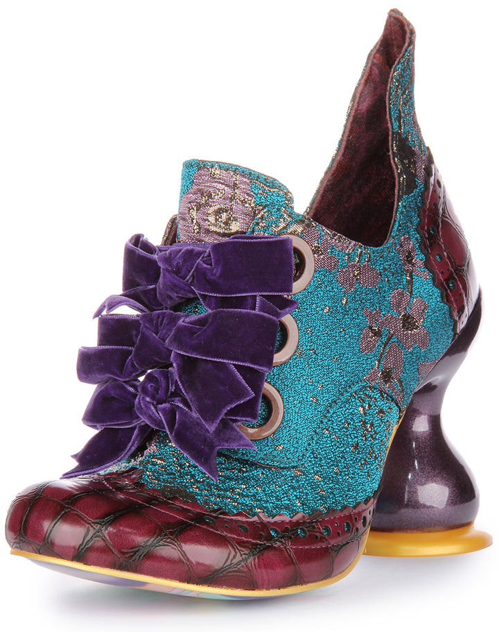 Irregular Choice Trapdoor Zapatos de tacón curvo con lazos para mujer en azul multi