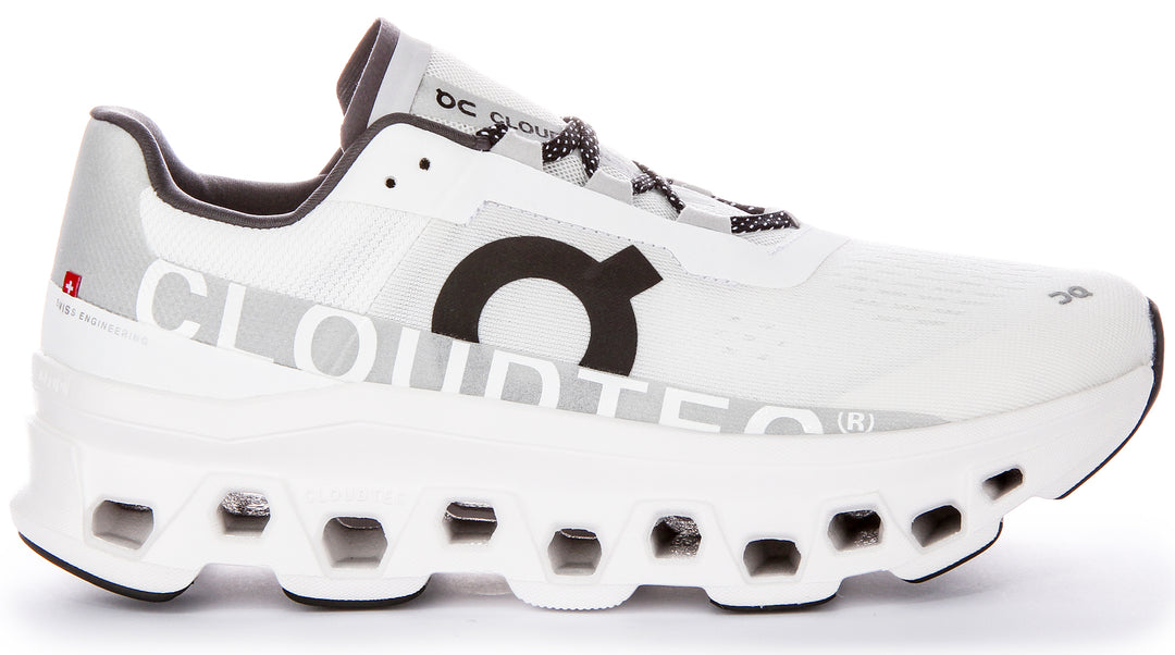 Chaussures de course emblématiques On Running Cloudmonster pour hommes avec technologie Cloudtec en blanc noir