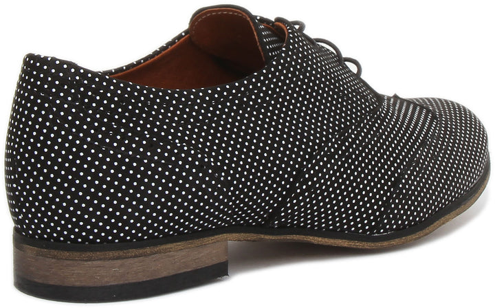 JUSTINREESS Kalina Zapatos brogue de piel con estampado de lunares para mujer en negro