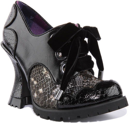 Irregular Choice Whimsical Windsor Chaussures à talons hauts incurvés métalliques pour femmes en noir