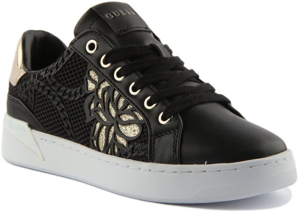black and gold guess shoes