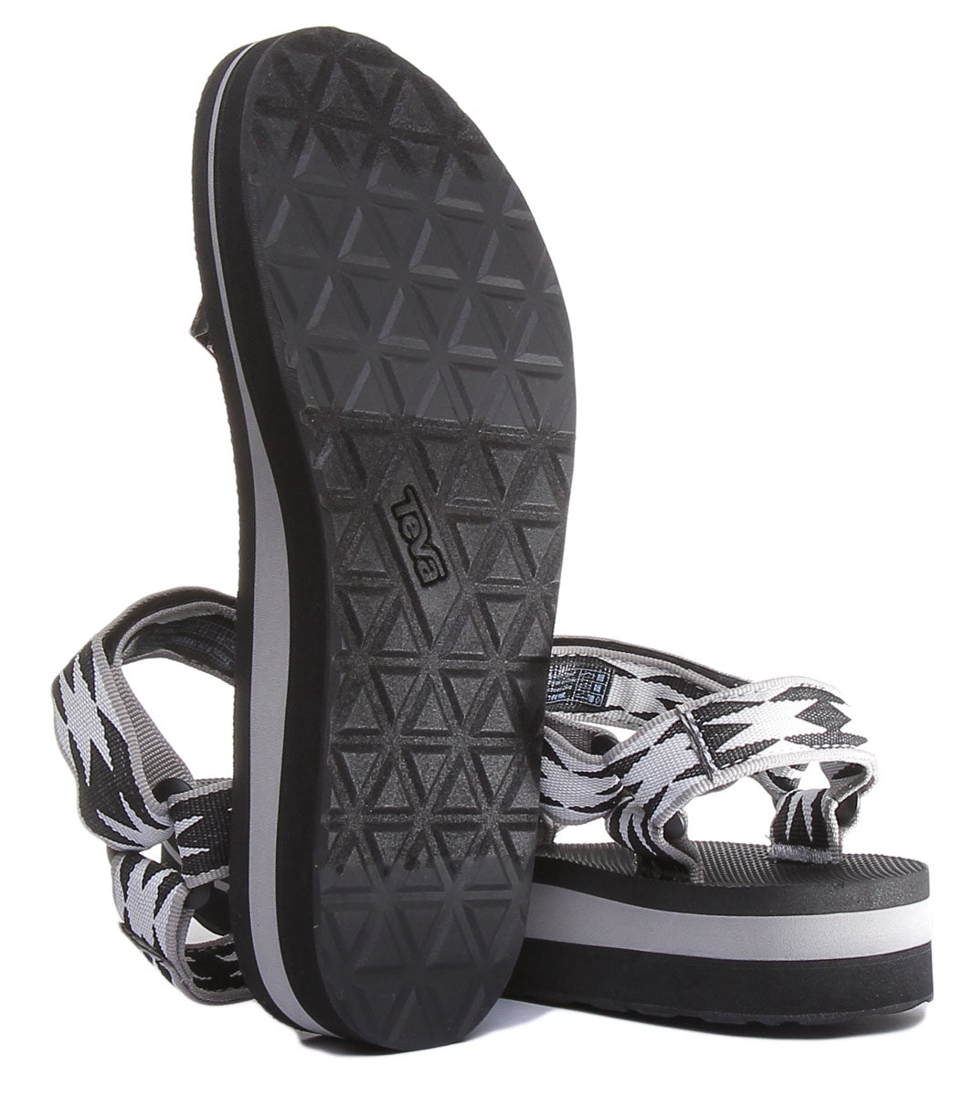 Teva Midform Universal Sandale à lanières à semelle surélevée pour femmes en noir blanc