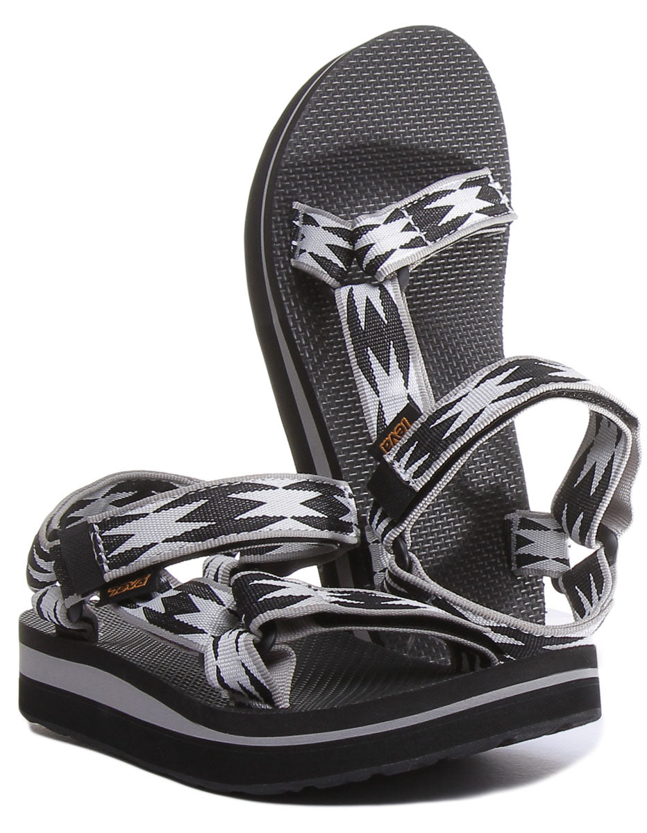 Teva Midform Universal Sandalo on cinturino a suola sollevata da donna in nero bianco