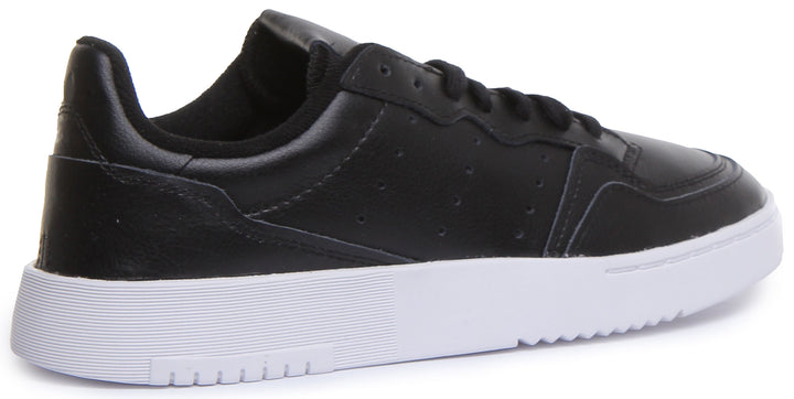 Adidas Supercourt J Chaussures de sport en cuir à lacets pour jeunes en noir et blanc