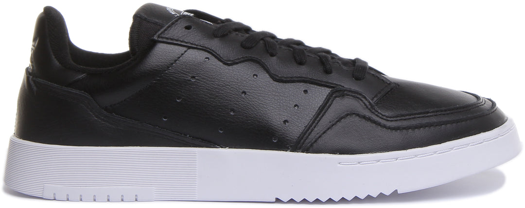 Adidas Supercourt pizzo su scarpe da ginnastica casual ispirate al tennis in bianco e nero