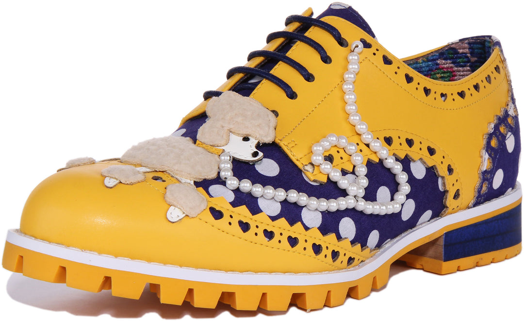 Irregular Choice Sockshop Sweetie Zapatos brogue de tela con perla de caniche para mujer en azul amarillo