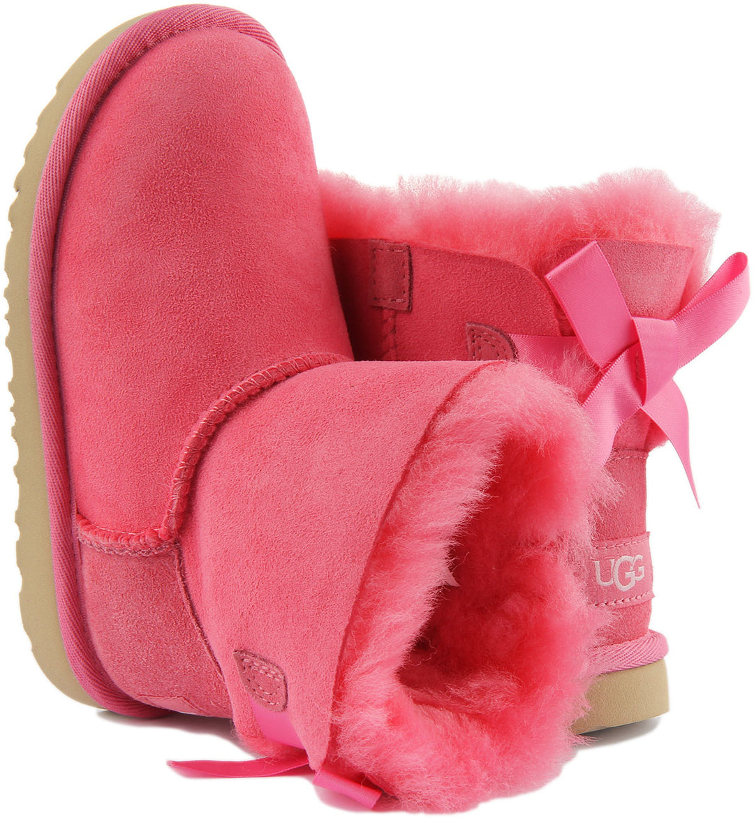 Ugg Mini Bailey Bow Bota de piel de oveja twinface para bebé en rosa