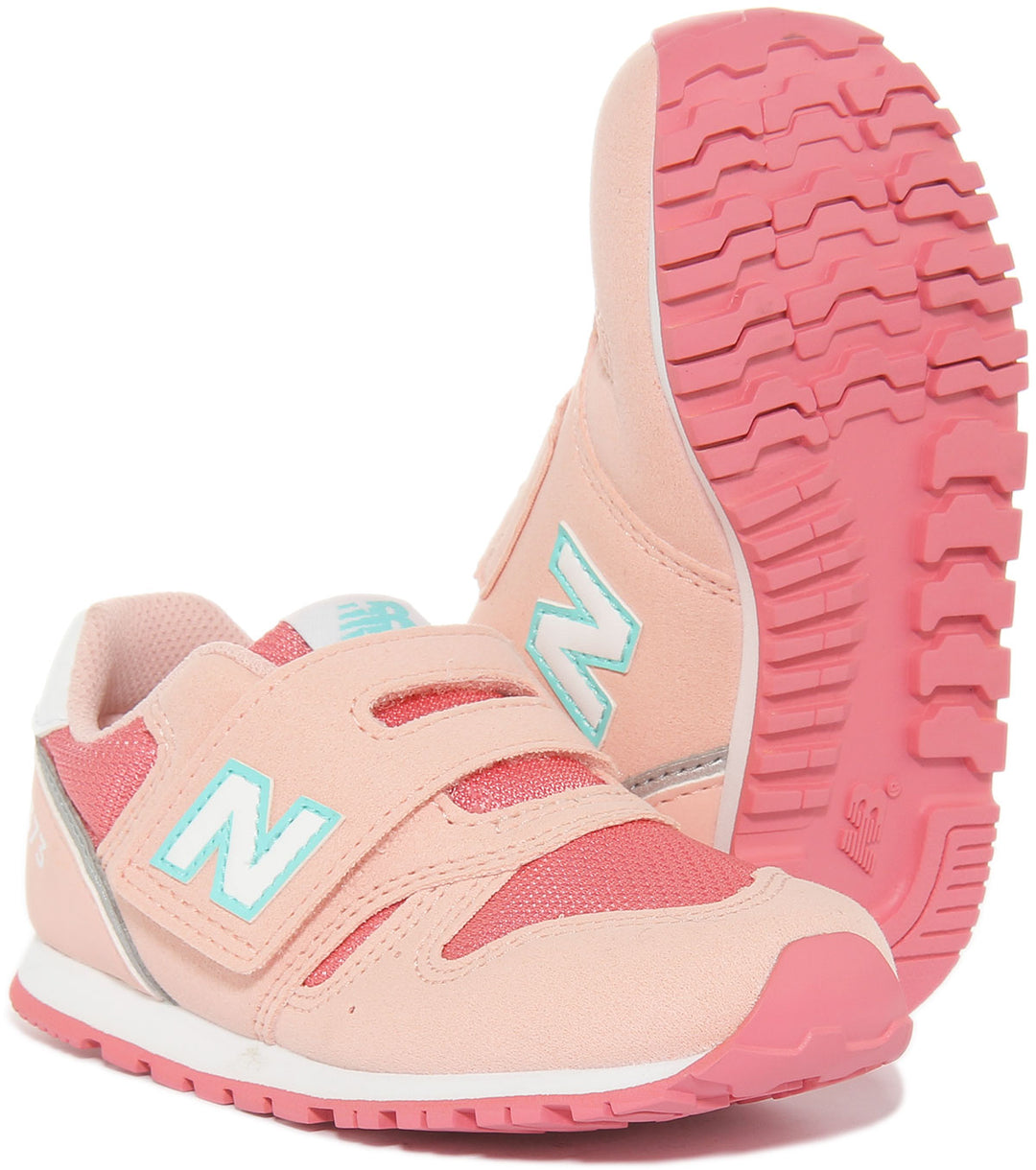 New Balance IZ373JD2 Zapatillas de deporte sintéticas con correa de gancho y bucle para bebés en rosa