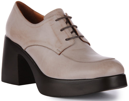 JUSTINREESS Rylan Zapatos Oxford de cordones de piel para mujer en piedra