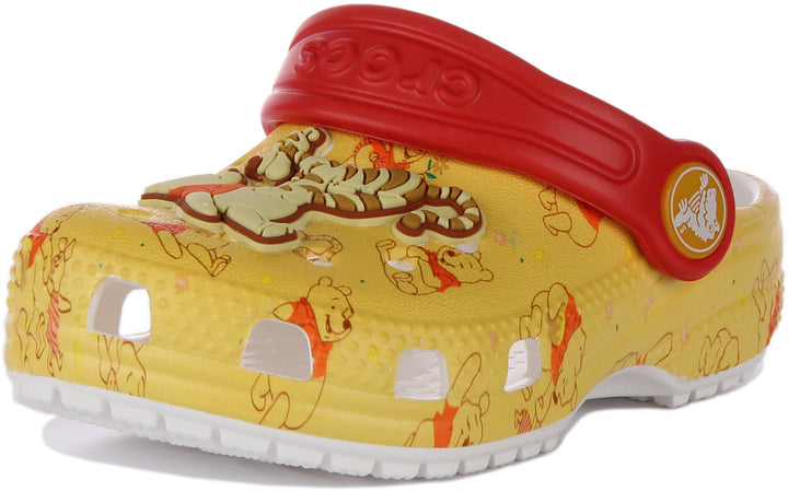 Crocs Classic Sandalia zueco Winnie The Pooh para niño en amarillo rojo